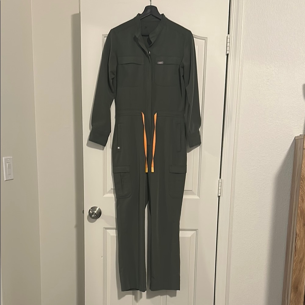 Figs Green Jumpsuit with Orange Drawstring and Collared Neckline.